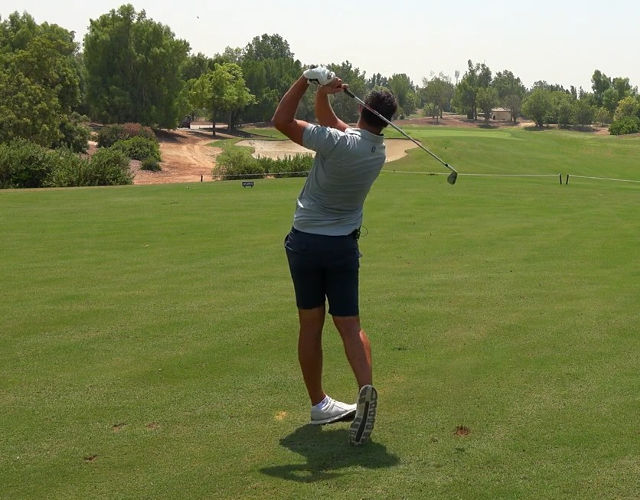 wearing asda mens shorts while playing golf
