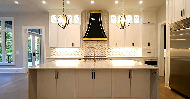 white kitchen brown and gold canopy